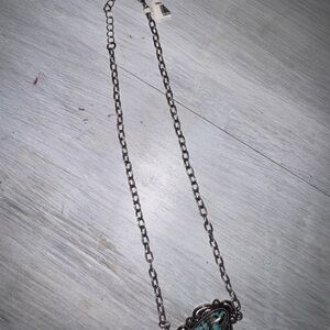 Elegant Silver and Turquoise Pendant Necklace